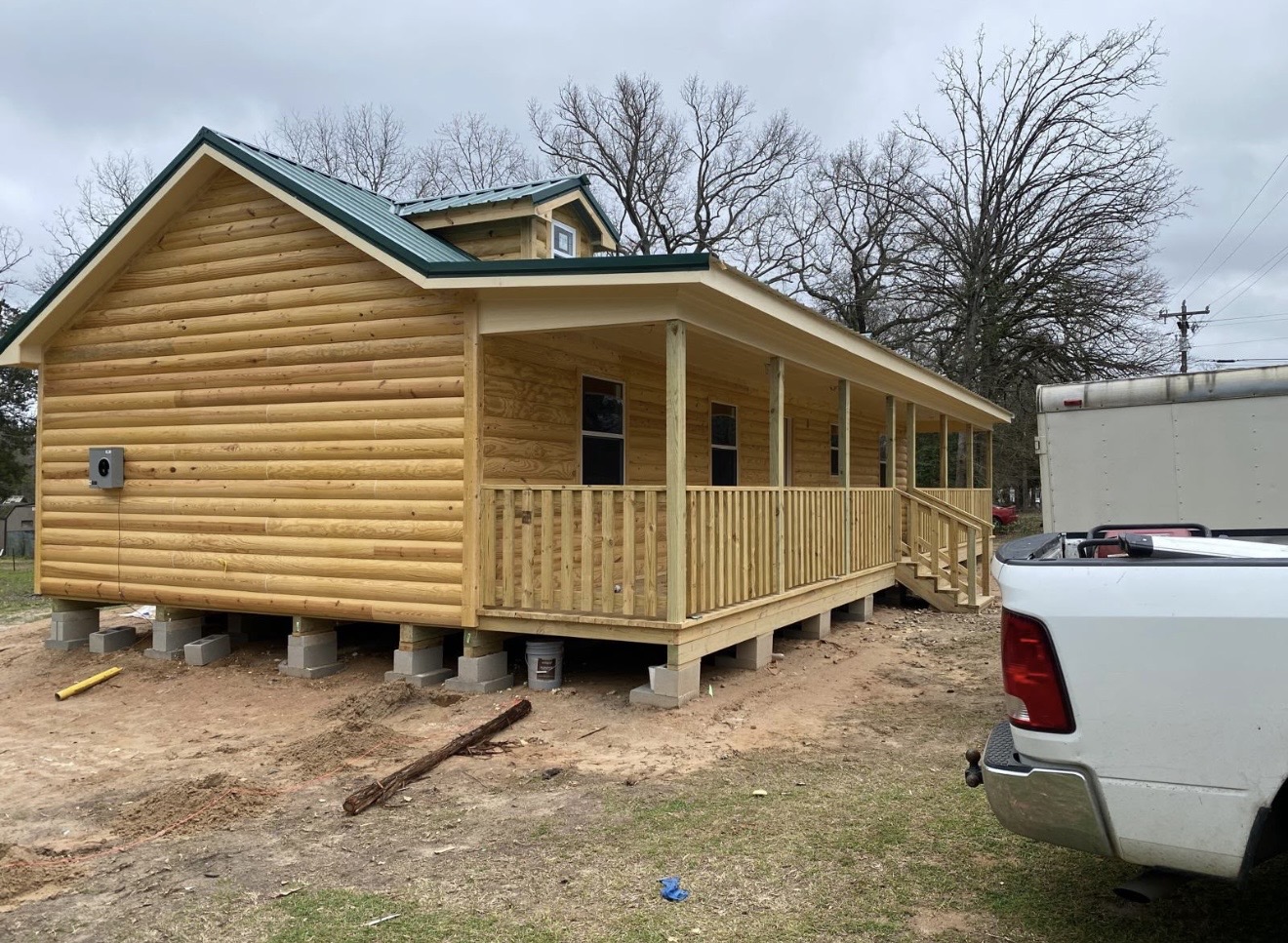 Completed tiny home with covered porch