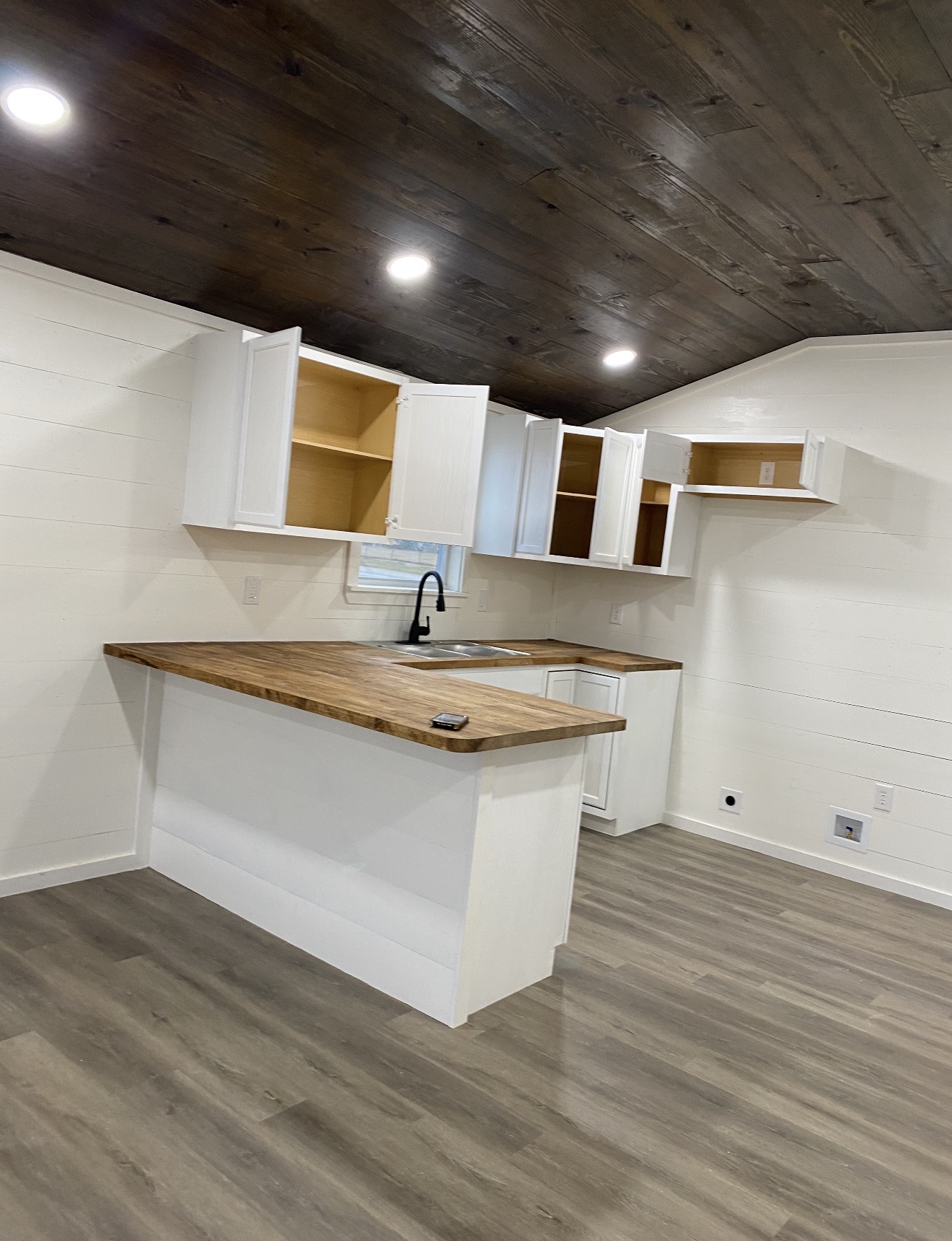 White kitchen with butcher-block counter